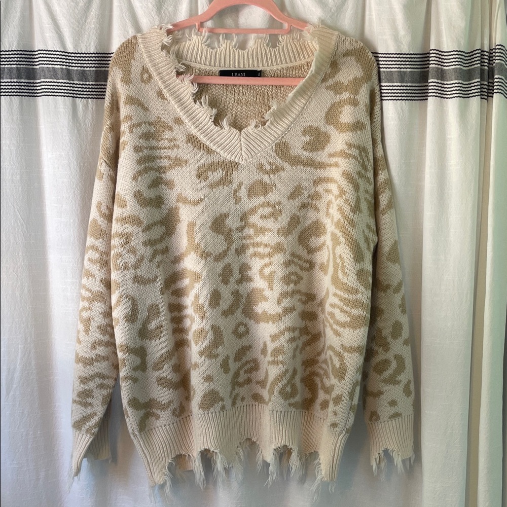 Elegant Beige and Tan Animal Print V-Neck Sweater